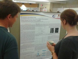 photo of Fiona Serack and her poster